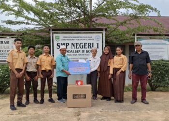 Holding Perkebunan Nusantara melalui PTPN IV Regional III Salurkan Rp2,4 Miliar untuk Perkuat Ekonomi dan Pendidikan di Rokan Hulu