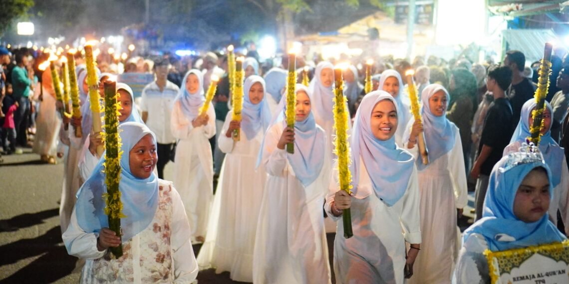 Pawai Obor dan Festival 2.026 Cup Kolak Ubi Meriahkan Peringatan Malam Nuzulul Qur’an di Molosipat W
